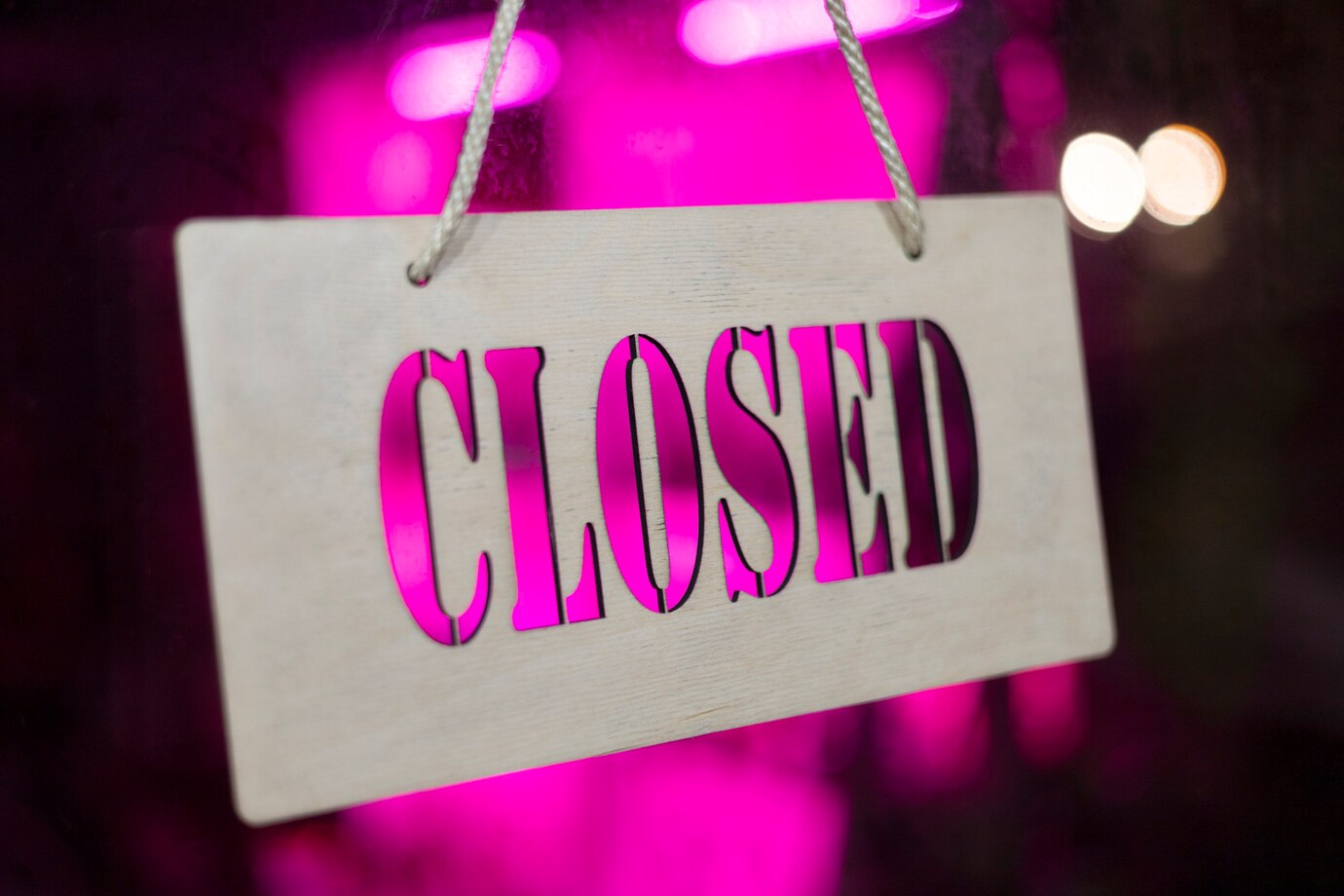 closed sign with bright purple light 23 2149169038